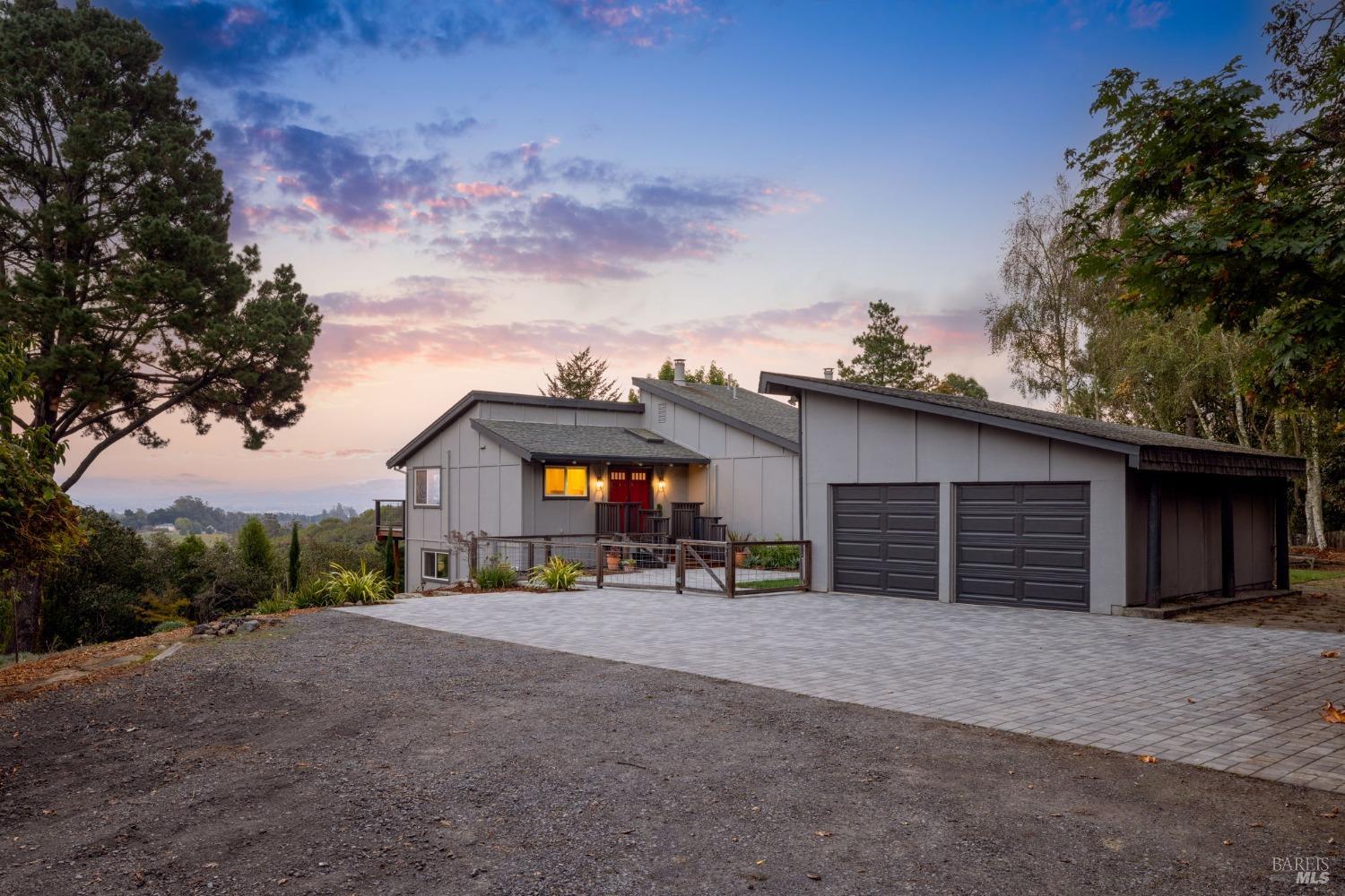 3370 Pharoahs Lane Sebastopol, CA 95472 - Photo 1 of 1 a view of a house with a yard and garage