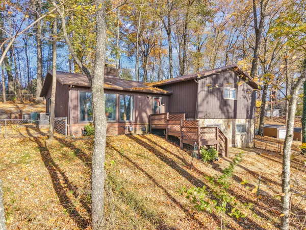 a house with trees in front of it