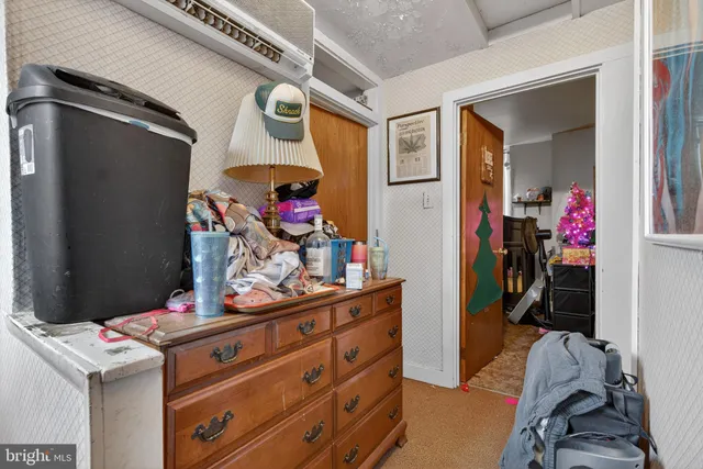 a bed room with a bed and a couch