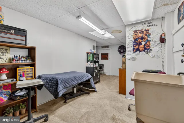 a view of a workspace with furniture and toys