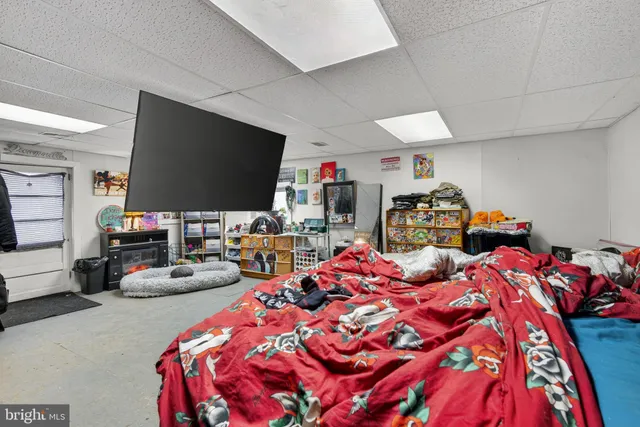 a bedroom with furniture and a bed