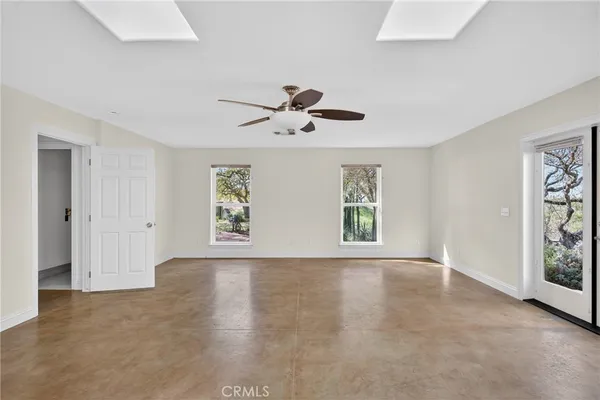 a bathroom with a double vanity sink and mirror with shower