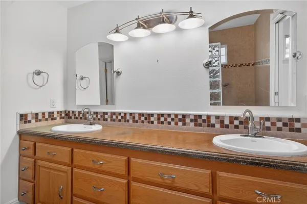 a bathroom with a sink and a toilet