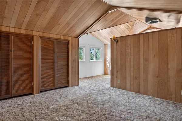 a house that has a tree in front of it