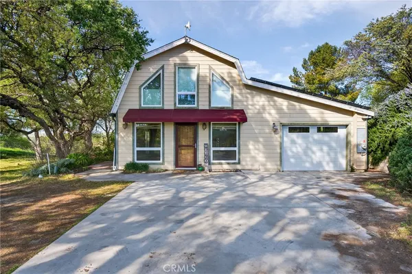 a view of a roof deck with wooden floor and fence
