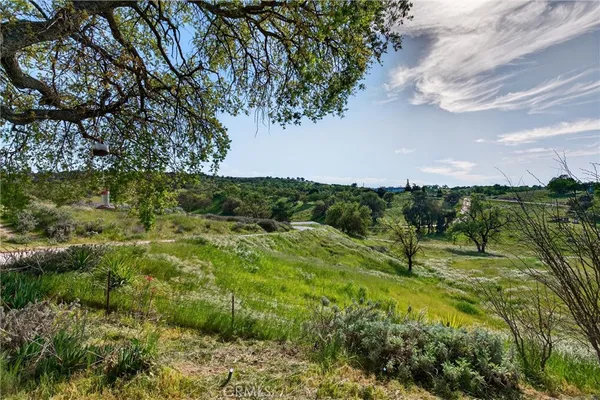 a view of a lake with big yard