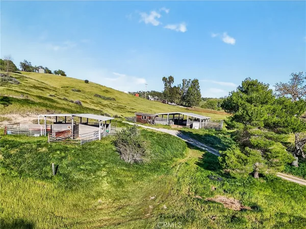 an aerial view of residential building with ocean view