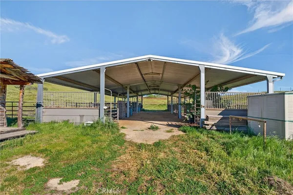 an aerial view of residential building and ocean view