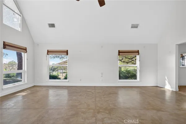 a kitchen with stainless steel appliances granite countertop a stove a sink and a granite counter tops