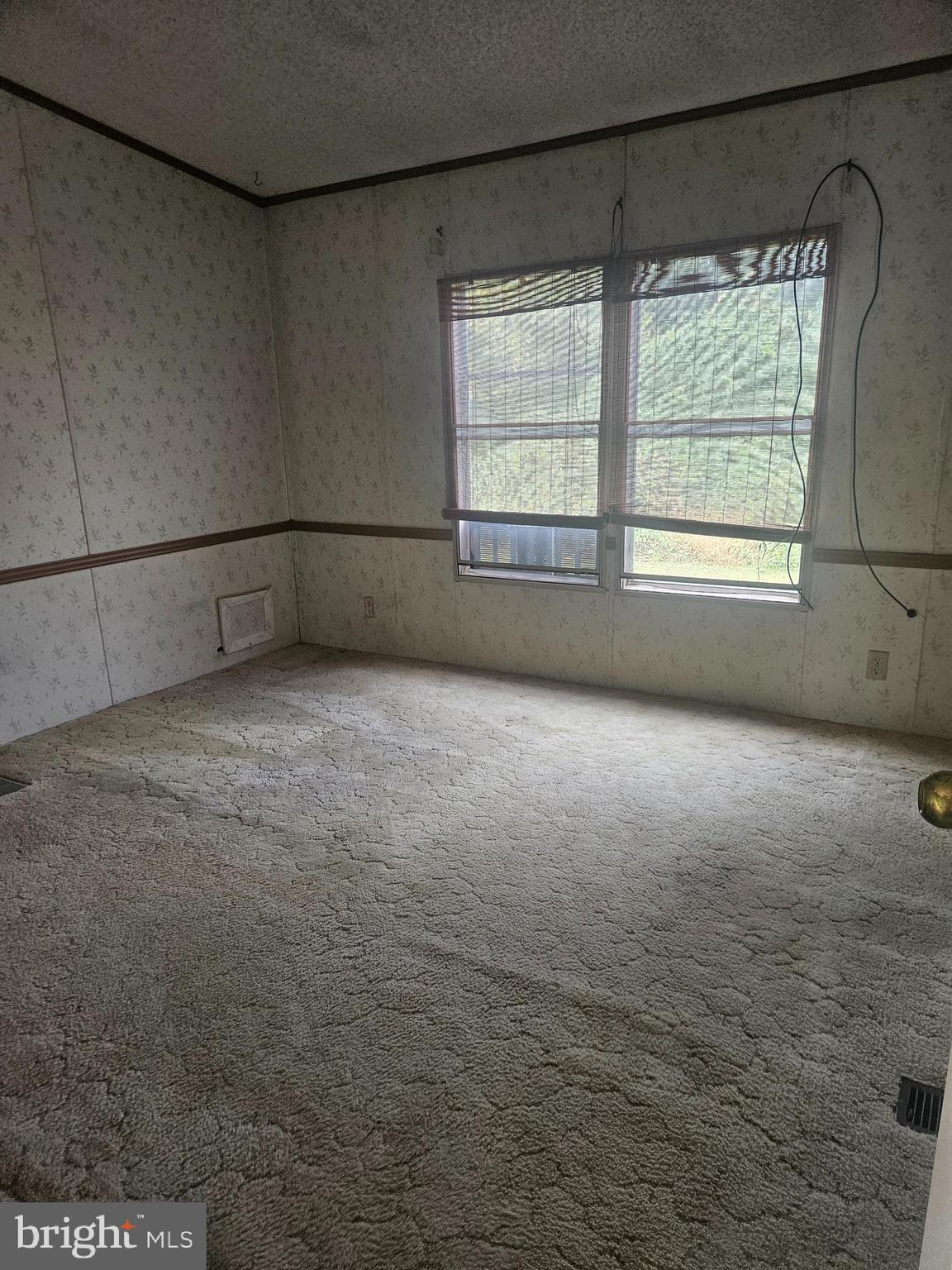 333 Newcomer Road Windsor, PA 17366 - Photo 21 of 25 a view of an empty room with a window