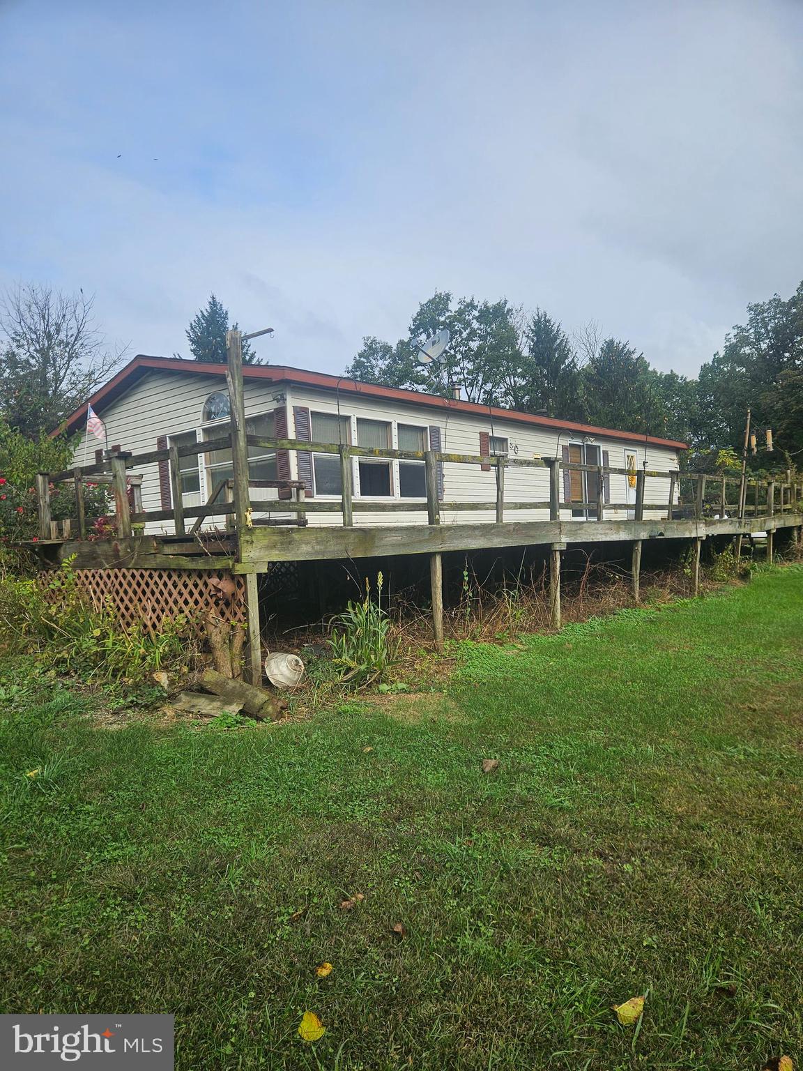 333 Newcomer Road Windsor, PA 17366 - Photo 7 of 25 a front view of a house with a yard table and chairs