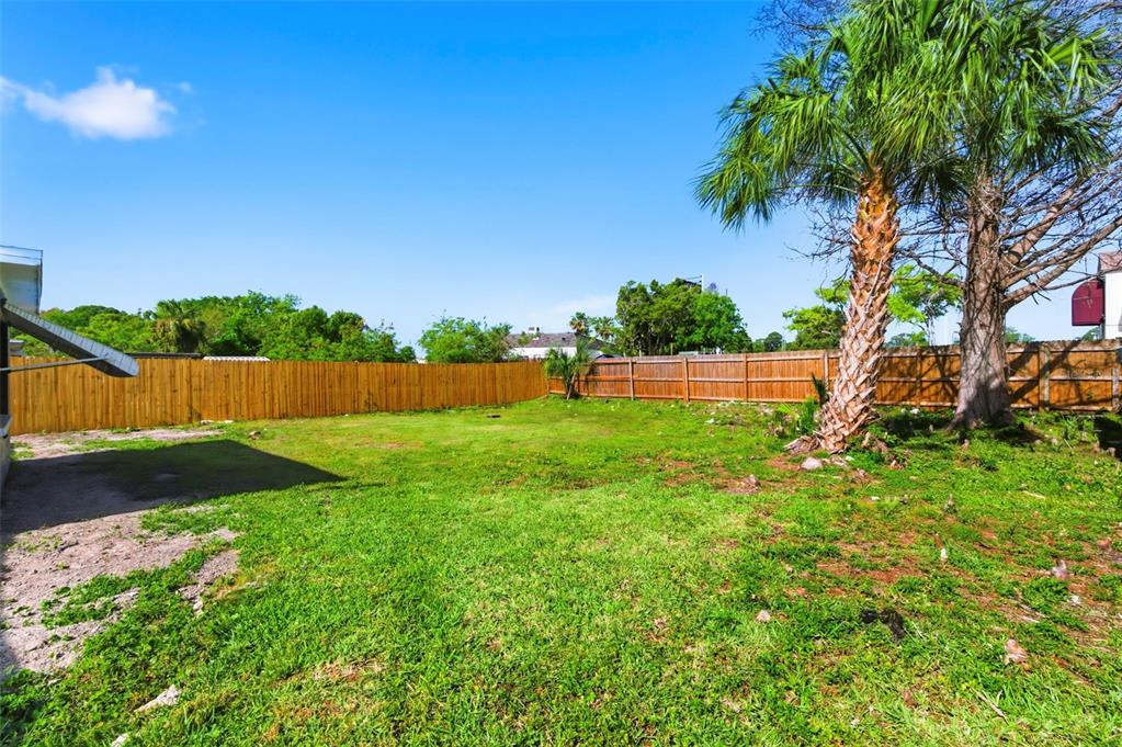 9033 Pegasus Avenue Port Richey, FL 34668 - Photo 44 of 56 a view of yard with green space
