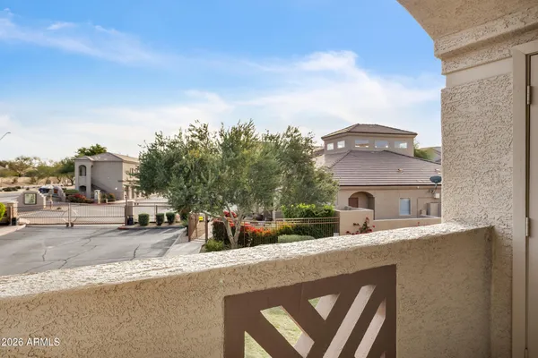 a view of balcony with furniture