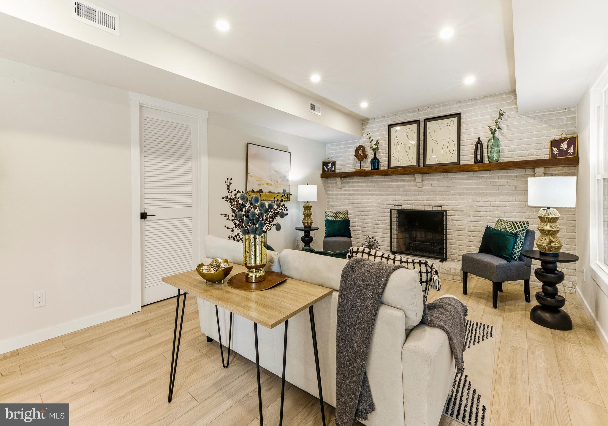 8 Michele Court Sewell, NJ 08080 - Photo 13 of 29 a view of a livingroom with furniture and a fireplace