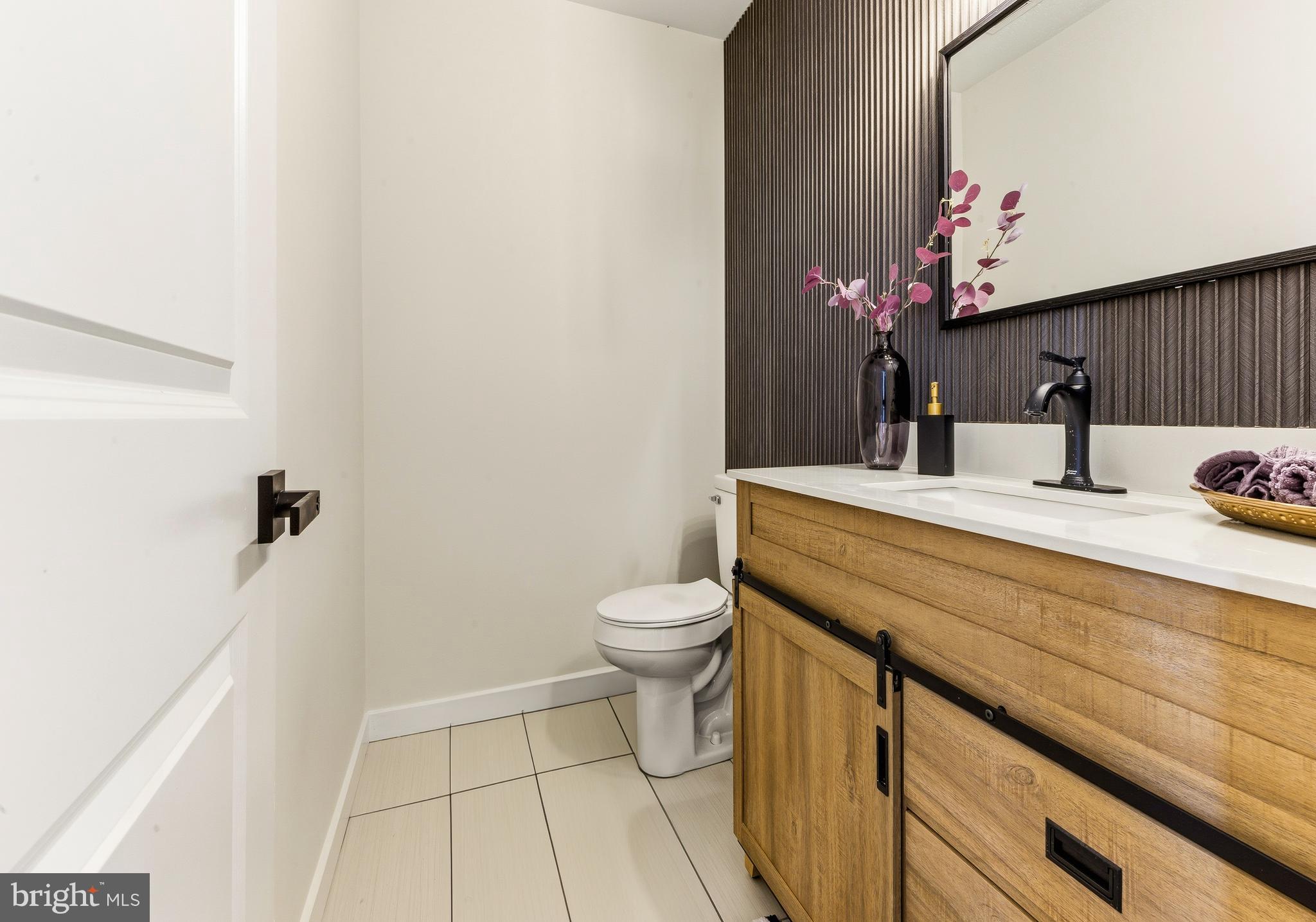 8 Michele Court Sewell, NJ 08080 - Photo 14 of 29 a bathroom with a sink vanity mirror and toilet