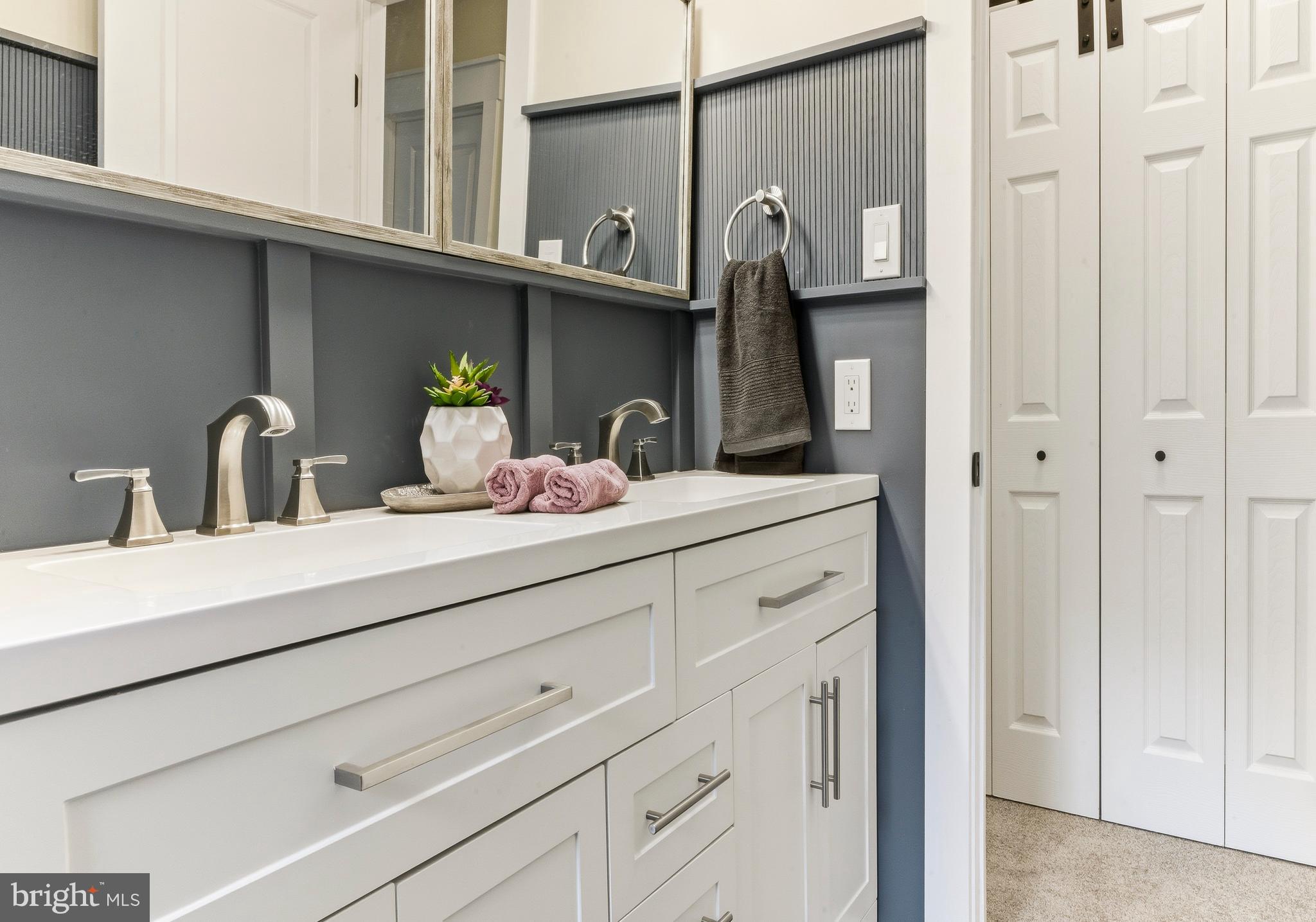 8 Michele Court Sewell, NJ 08080 - Photo 23 of 29 a bathroom with a sink and a mirror
