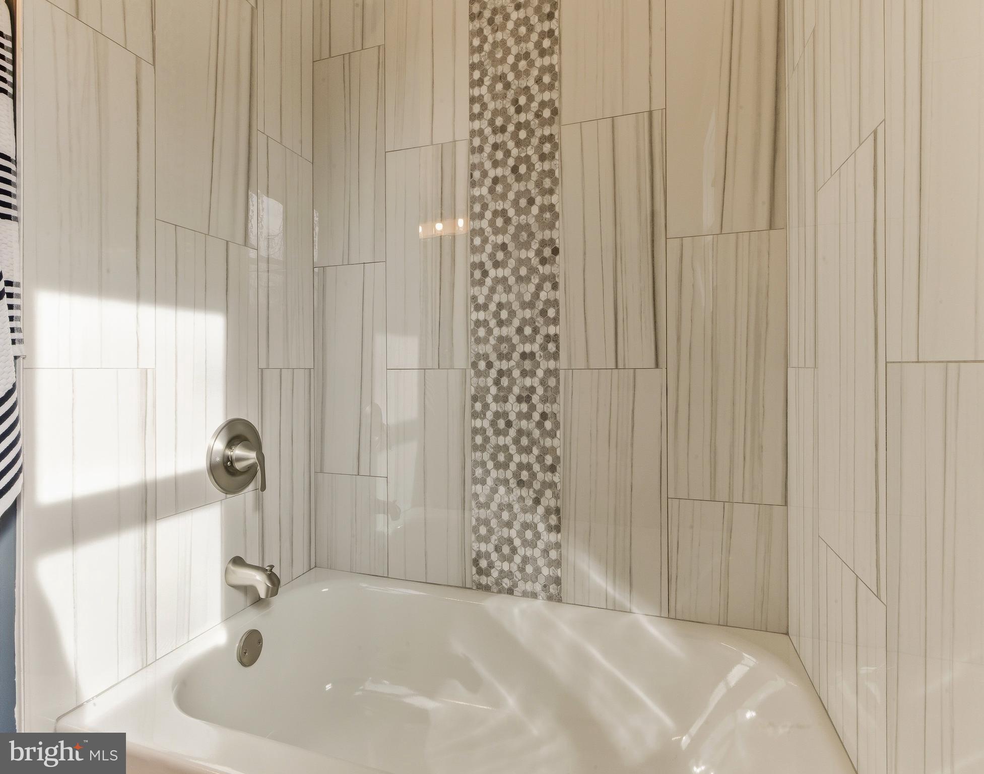 8 Michele Court Sewell, NJ 08080 - Photo 25 of 29 a bathroom with a sink a toilet and shower curtain