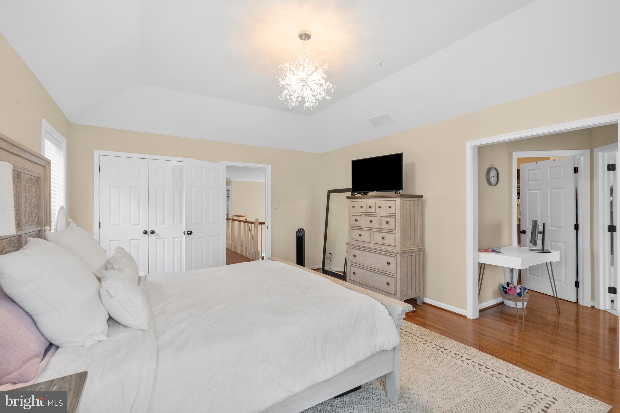 776 Barry Drive Springfield, PA 19064 - Photo 23 of 44 a spacious bedroom with a bed and a flat tv screen on dresser