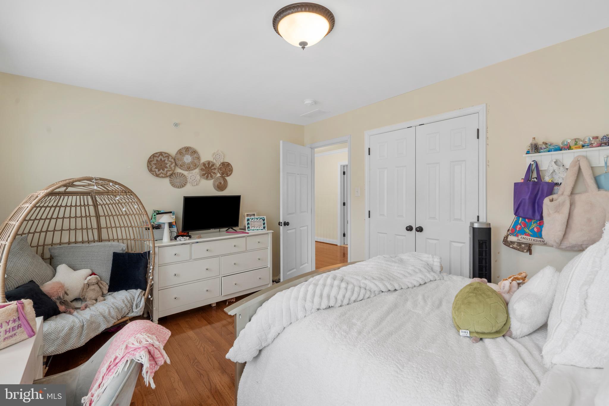 776 Barry Drive Springfield, PA 19064 - Photo 29 of 44 a bedroom with furniture and a flat screen tv
