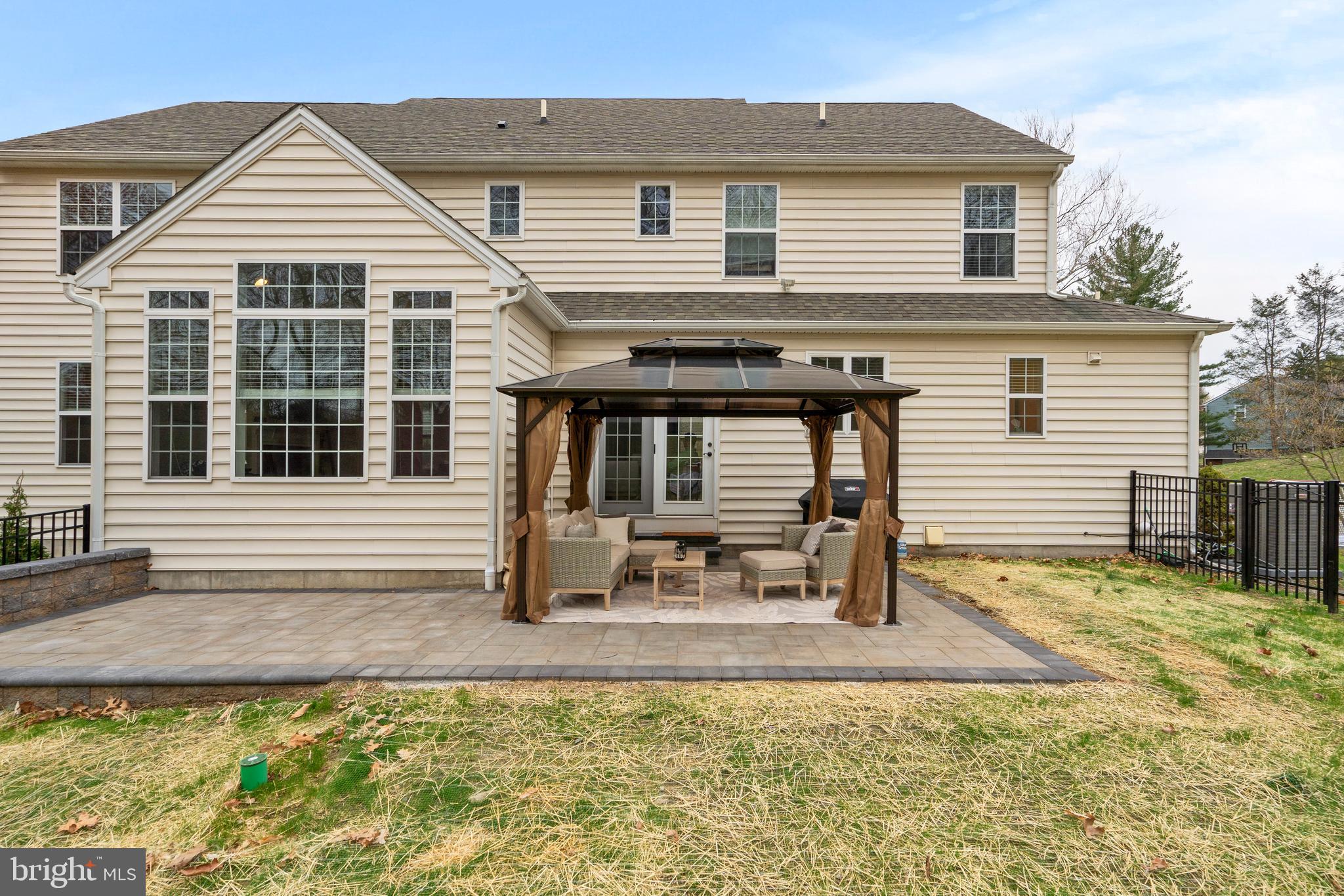 776 Barry Drive Springfield, PA 19064 - Photo 41 of 44 a backyard of a house with table and chairs