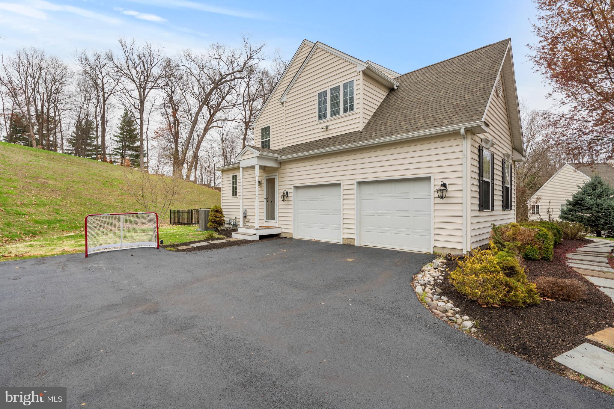 776 Barry Drive Springfield, PA 19064 - Photo 43 of 44 a view of a house with a yard and garage
