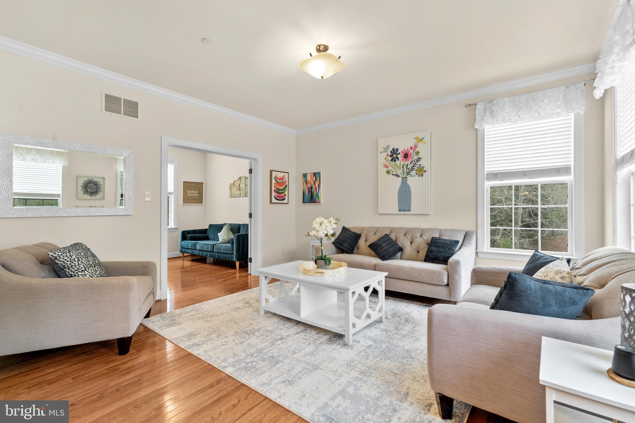 776 Barry Drive Springfield, PA 19064 - Photo 6 of 44 a living room with furniture and a large window