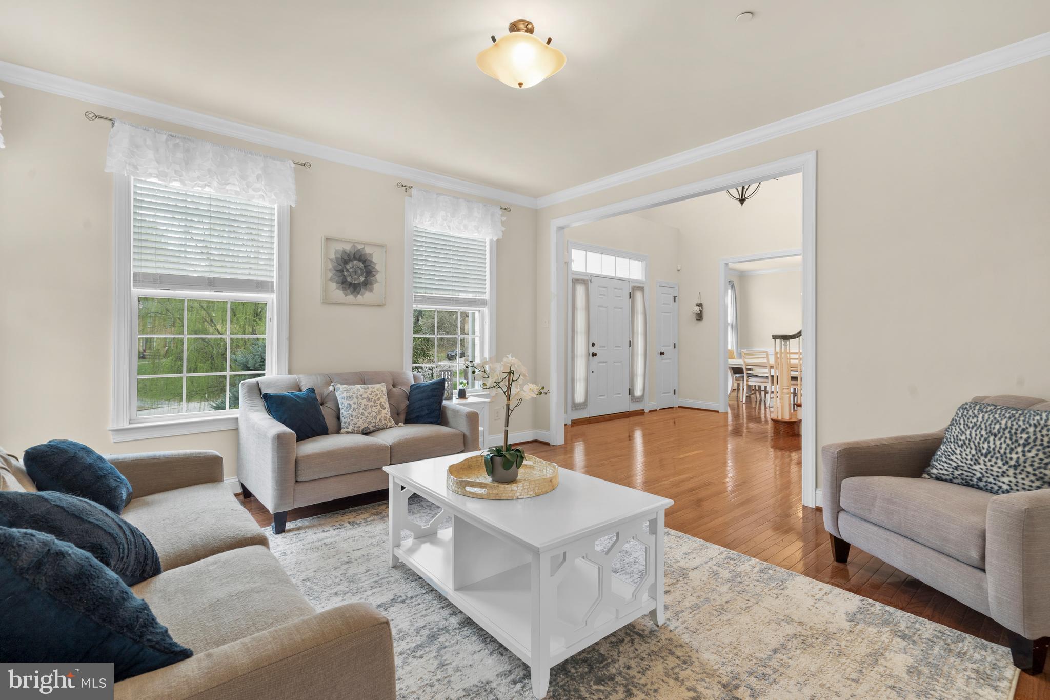 776 Barry Drive Springfield, PA 19064 - Photo 7 of 44 a living room with furniture and a large window