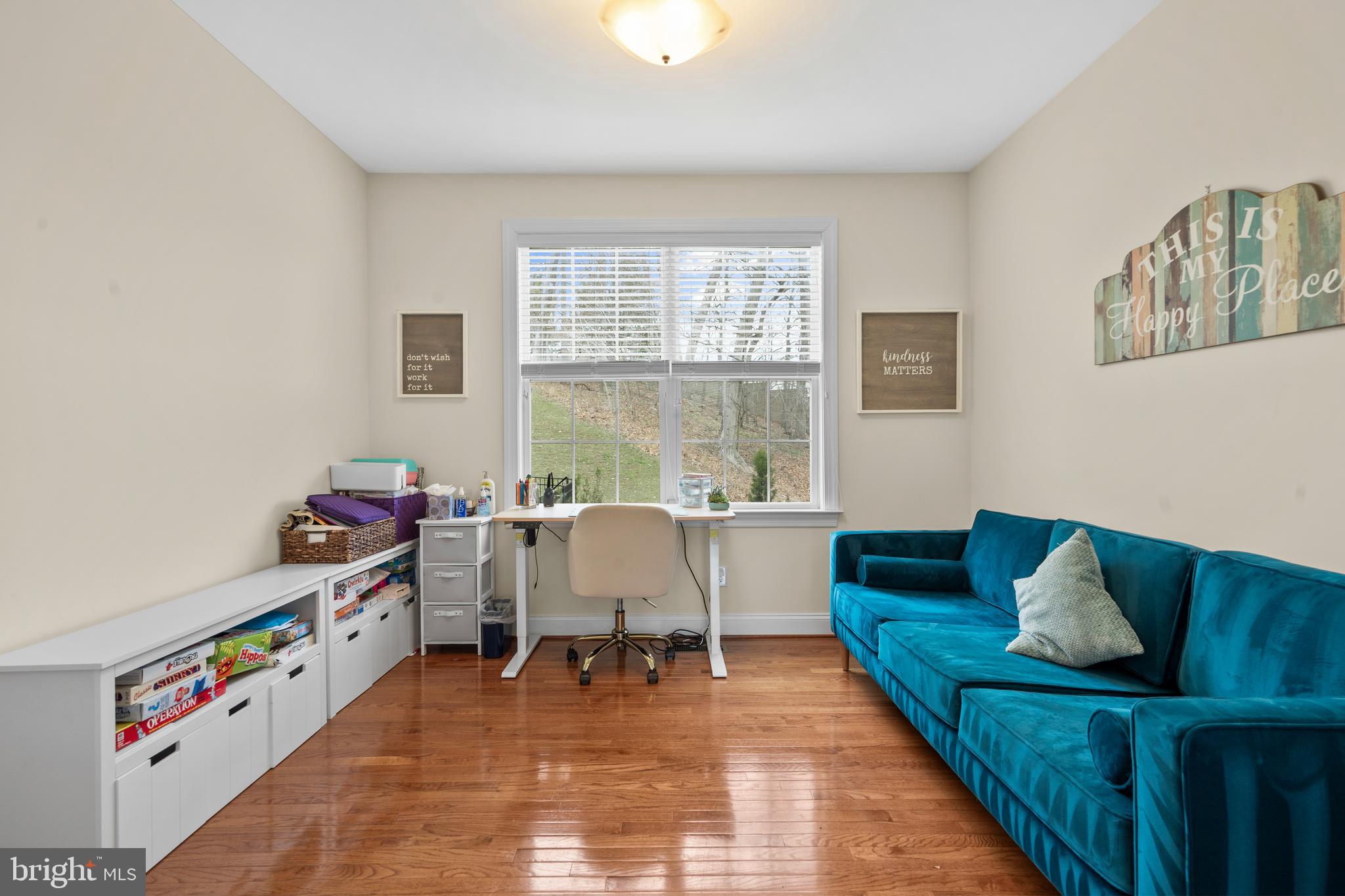 776 Barry Drive Springfield, PA 19064 - Photo 8 of 44 a living room with furniture and a wooden floor
