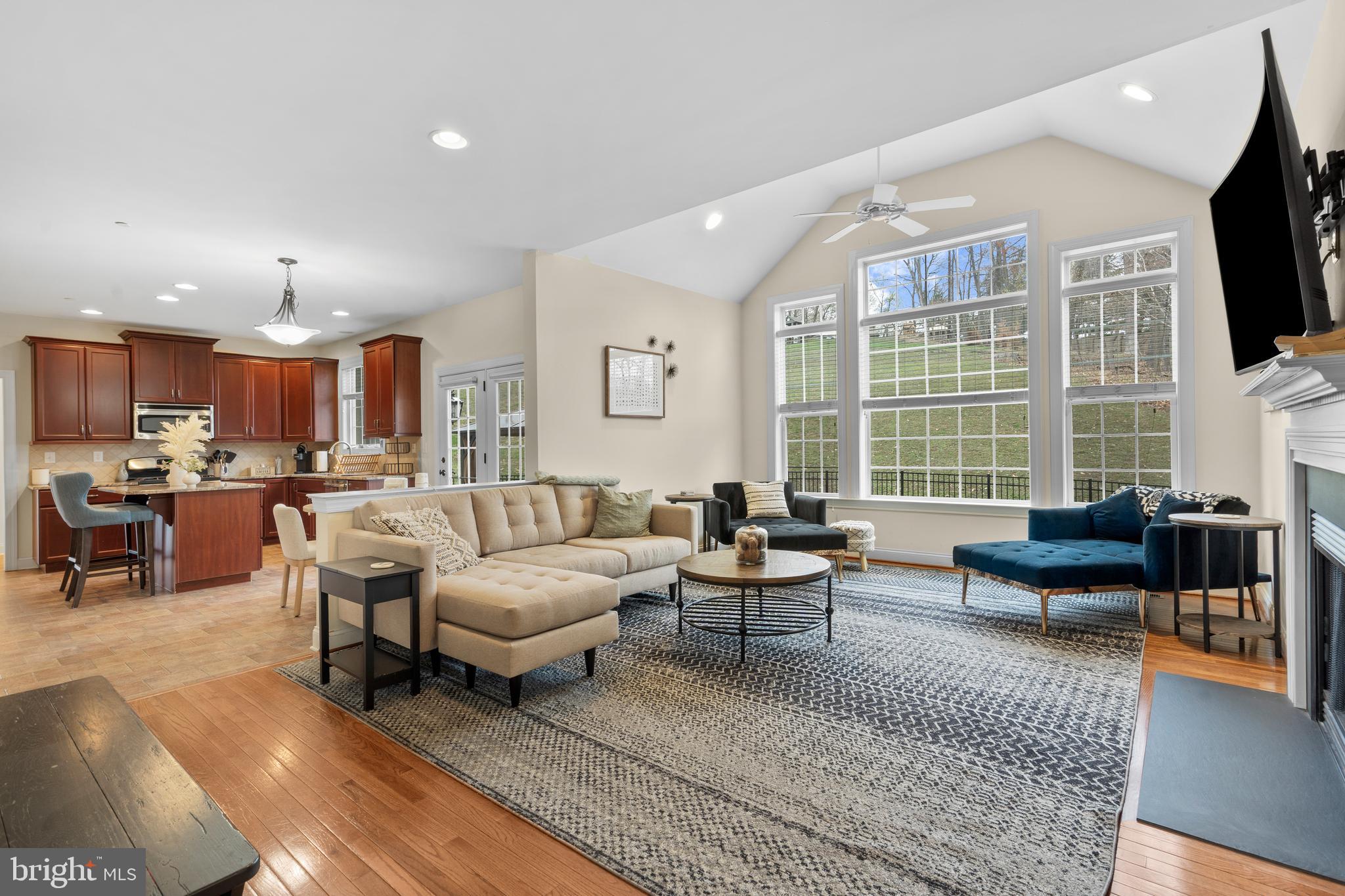 776 Barry Drive Springfield, PA 19064 - Photo 9 of 44 a living room with furniture and a flat screen tv