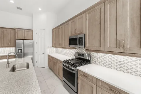 a view of a room with a large window