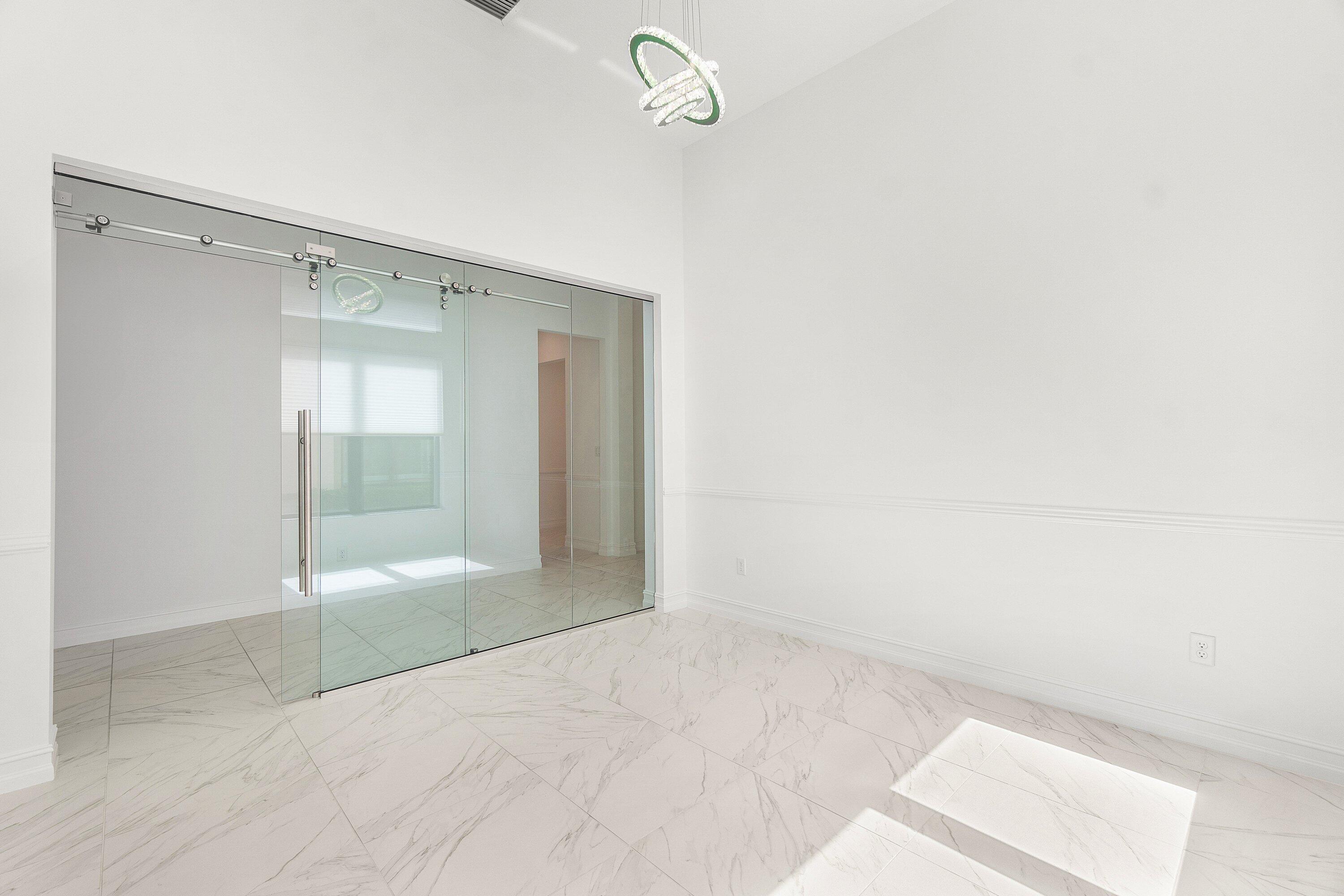 11902 Palermo Road Parkland, FL 33076 - Photo 6 of 48 a bathroom with a bathtub and shower