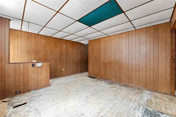 a kitchen with sink cabinets and window