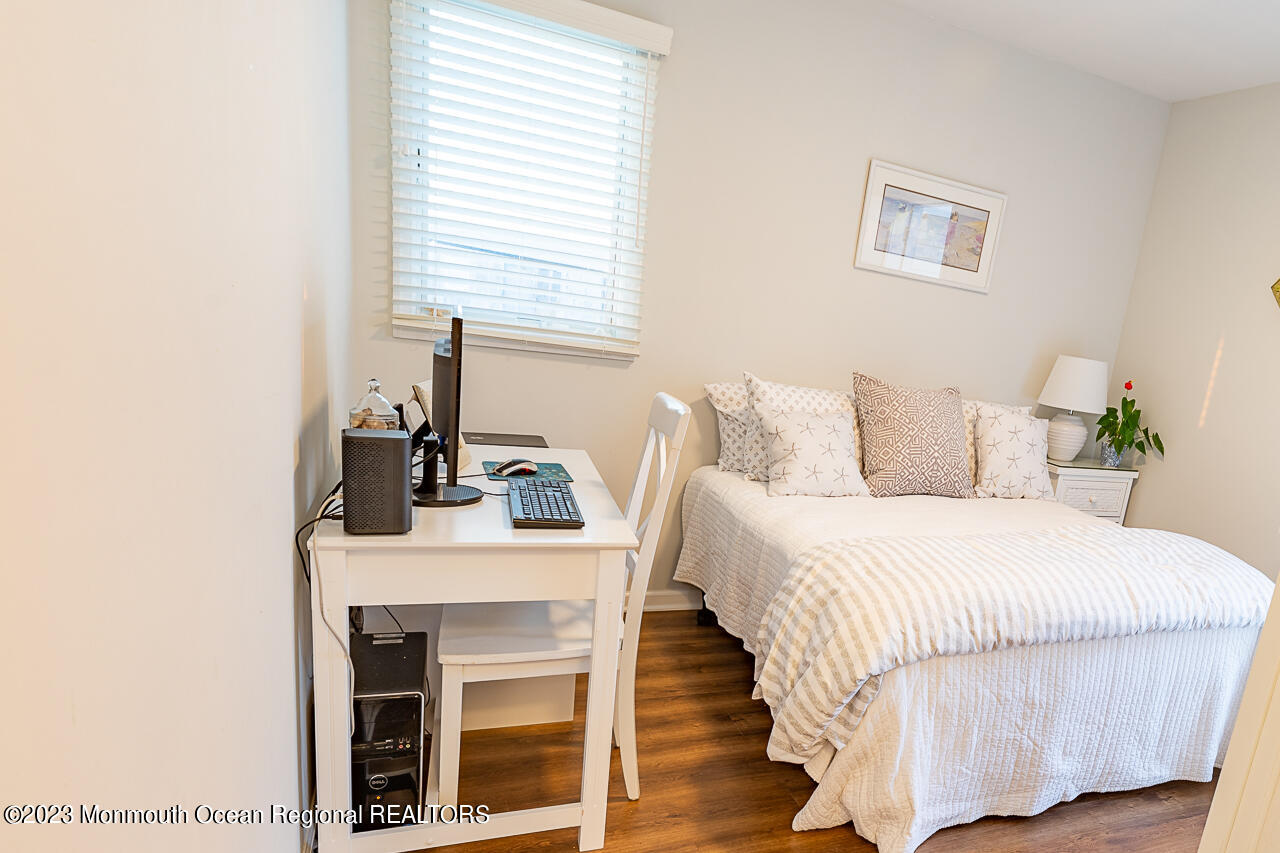 337 Kingfisher Road Tuckerton, NJ 08087 - Photo 16 of 41 a bedroom with a bed and a table