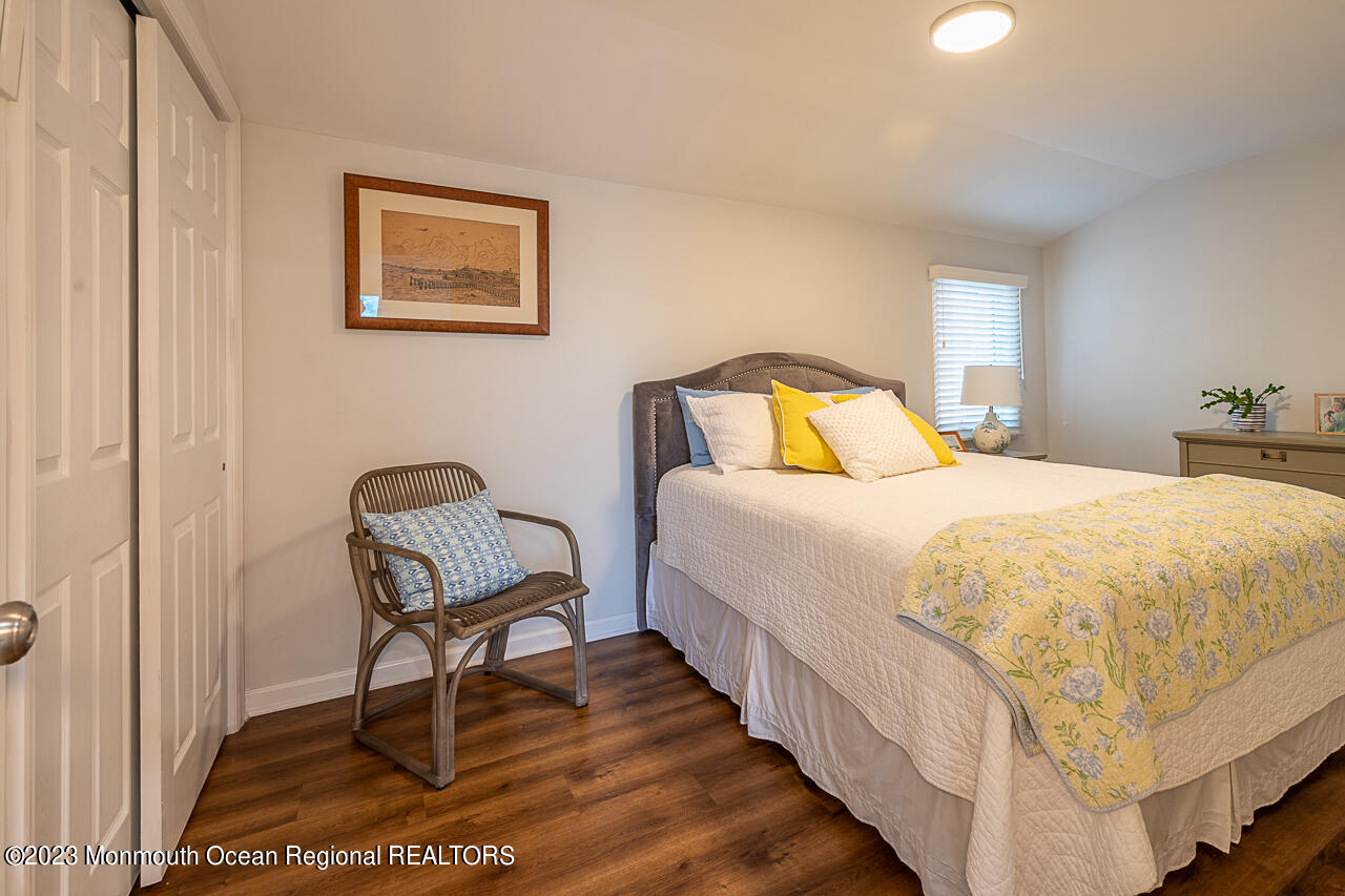 337 Kingfisher Road Tuckerton, NJ 08087 - Photo 19 of 41 a bedroom with a bed a chair and painting on the wall