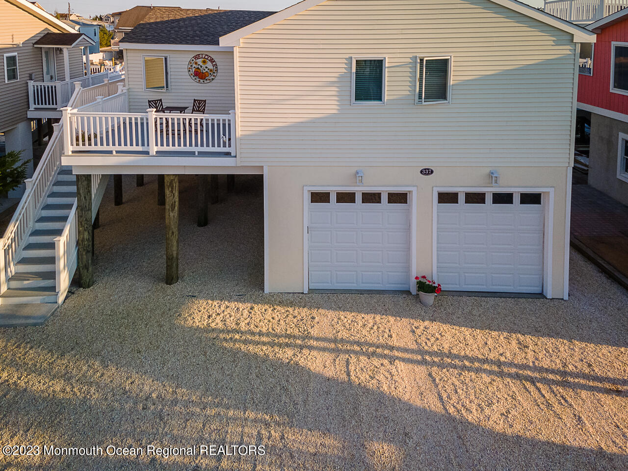 337 Kingfisher Road Tuckerton, NJ 08087 - Photo 2 of 41 a front view of a house with wooden fence