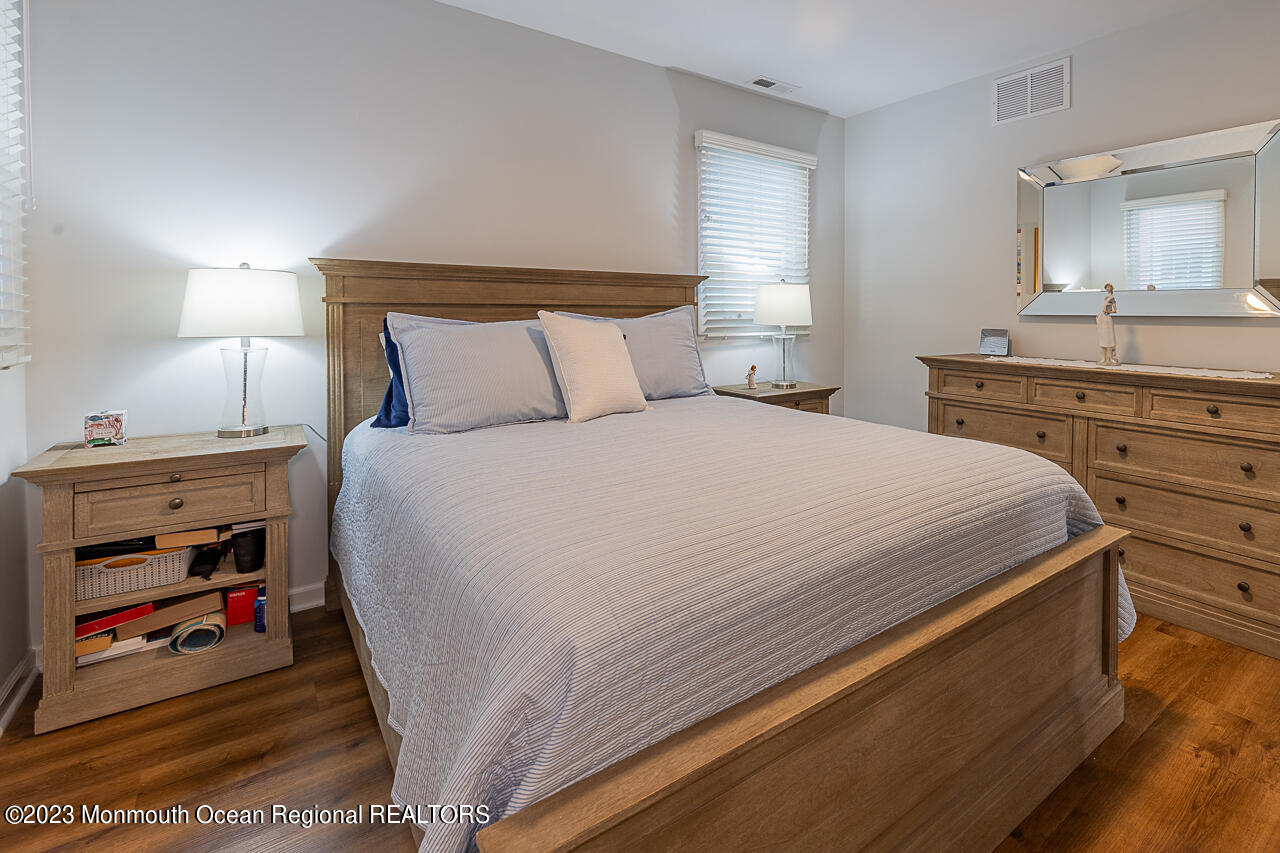 337 Kingfisher Road Tuckerton, NJ 08087 - Photo 21 of 41 a bedroom with a bed and a dresser