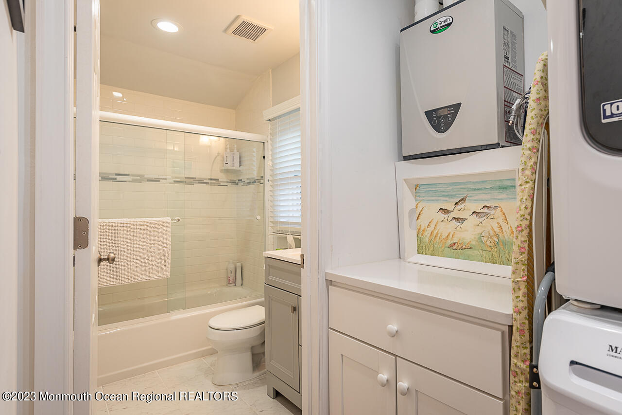 337 Kingfisher Road Tuckerton, NJ 08087 - Photo 24 of 41 a bathroom with a toilet a sink and a shower