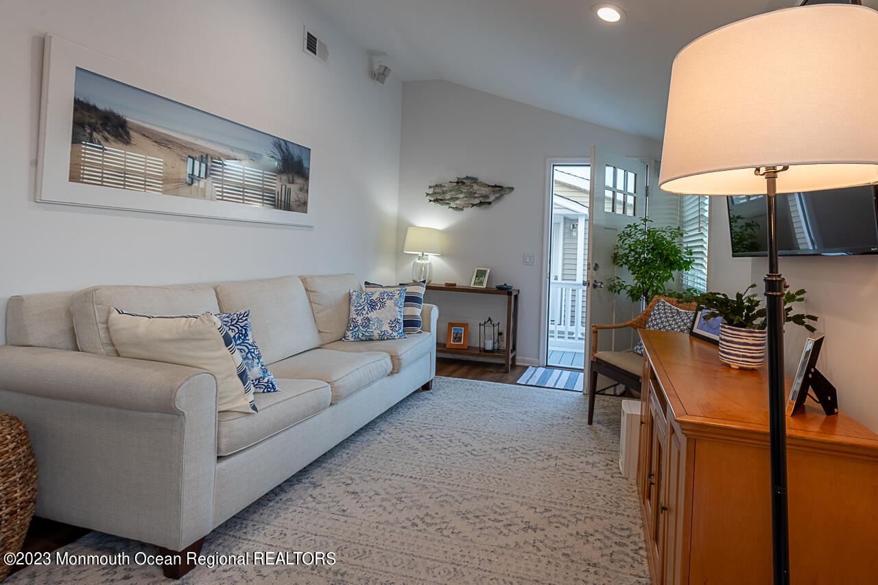 337 Kingfisher Road Tuckerton, NJ 08087 - Photo 5 of 41 a living room with furniture and a lamp