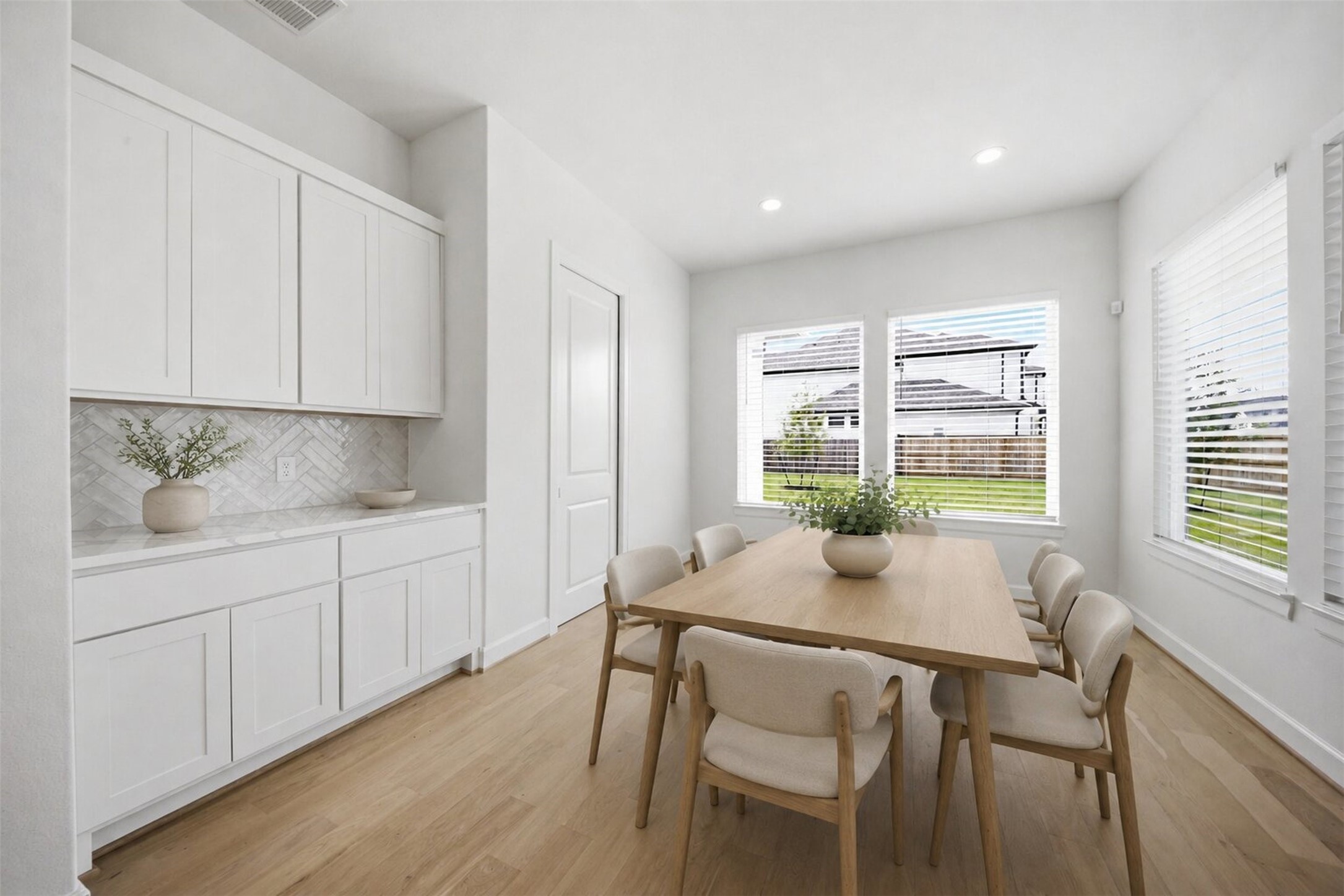 416 Venado View Court Conroe, TX 77304 - Photo 9 of 34 **Virtually Staged** Bright and airy dining space conveniently located adjacent to the kitchen with abundant natural light and built-in serving cabinetry.