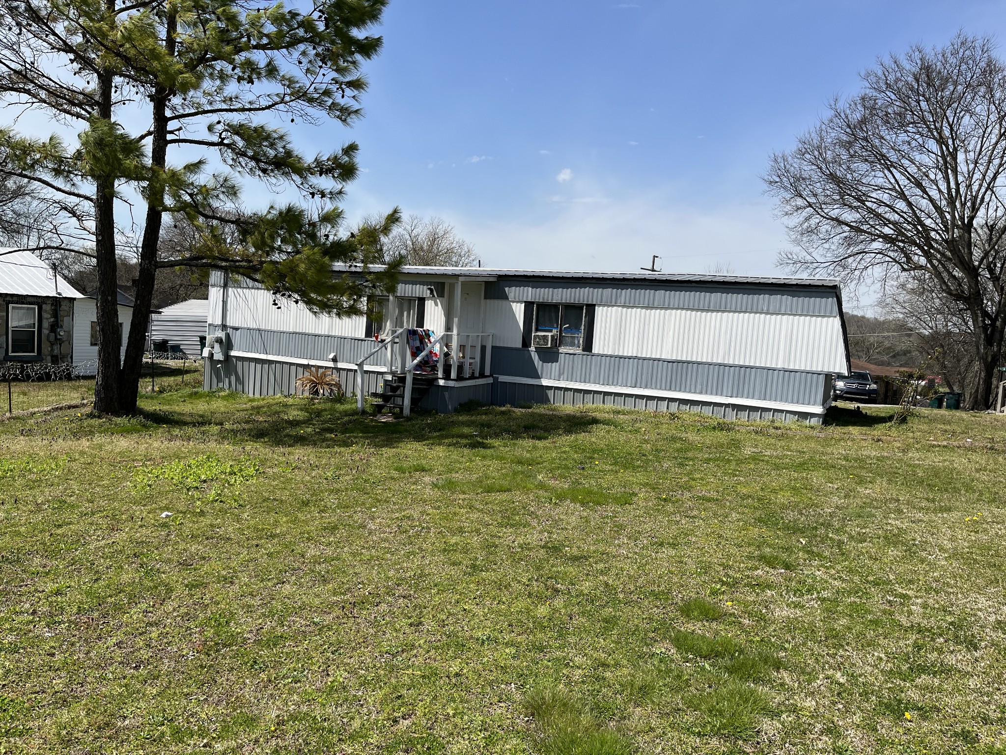a view of a house with a big yard