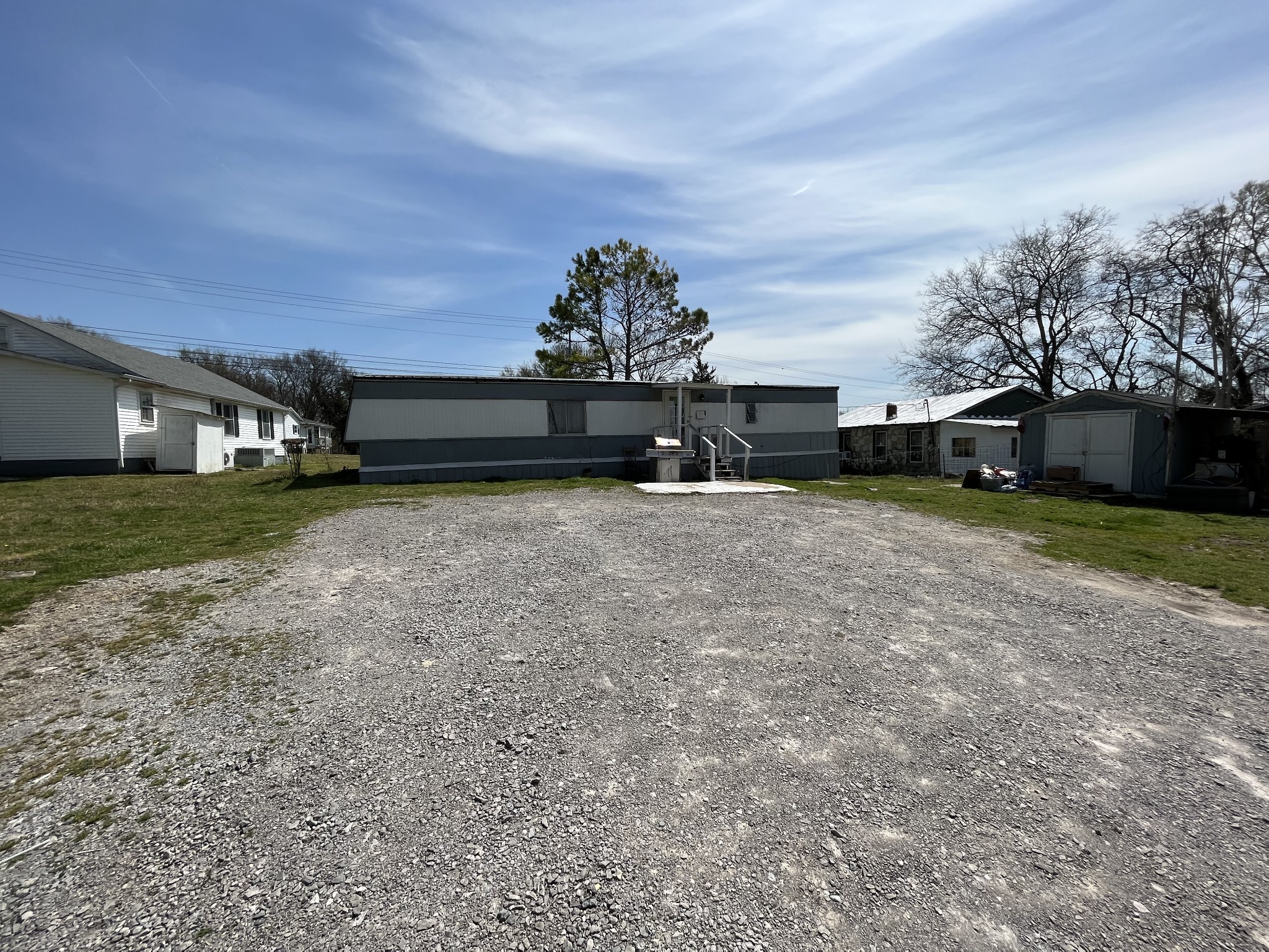 838 Ragsdale Lane Pulaski, TN 38478 - Photo 4 of 12 a view of a house with a yard and a large tree