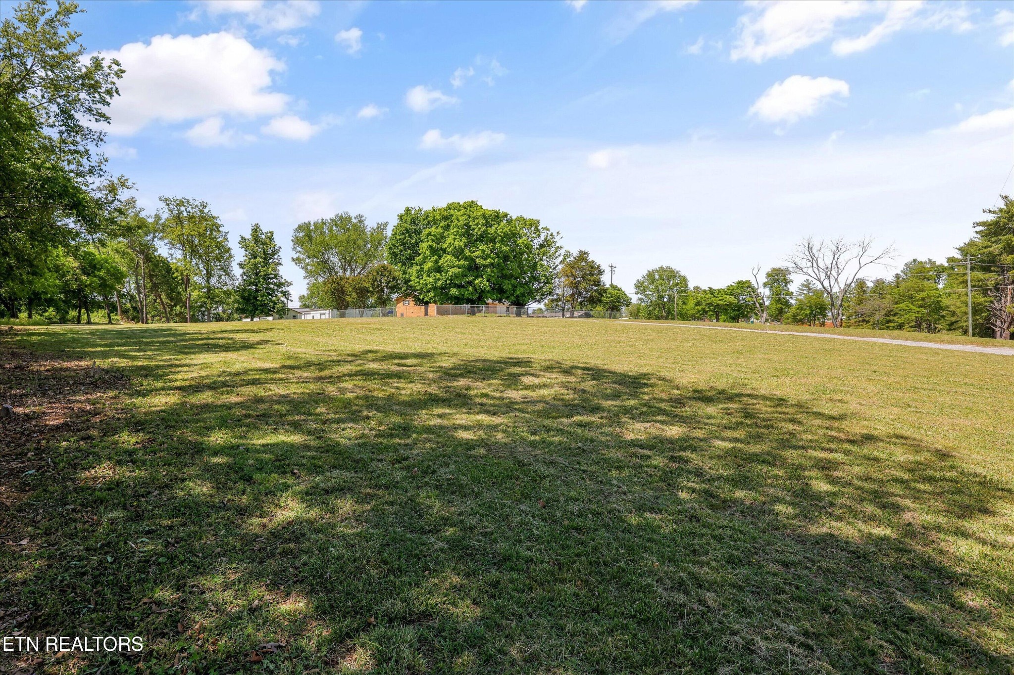 0 Gregory Road Greenback, TN 37742 - Photo 2 of 11 a view of an ocean beach and trees