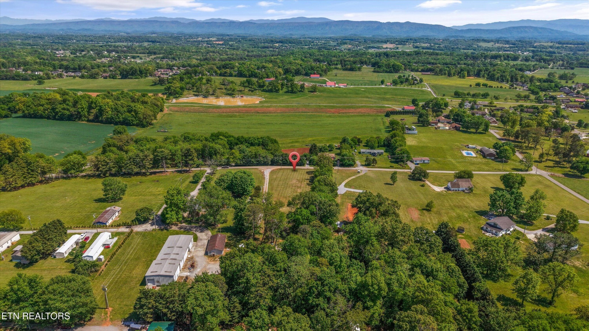 0 Gregory Road Greenback, TN 37742 - Photo 9 of 11 an aerial view of residential houses with outdoor space and lake view