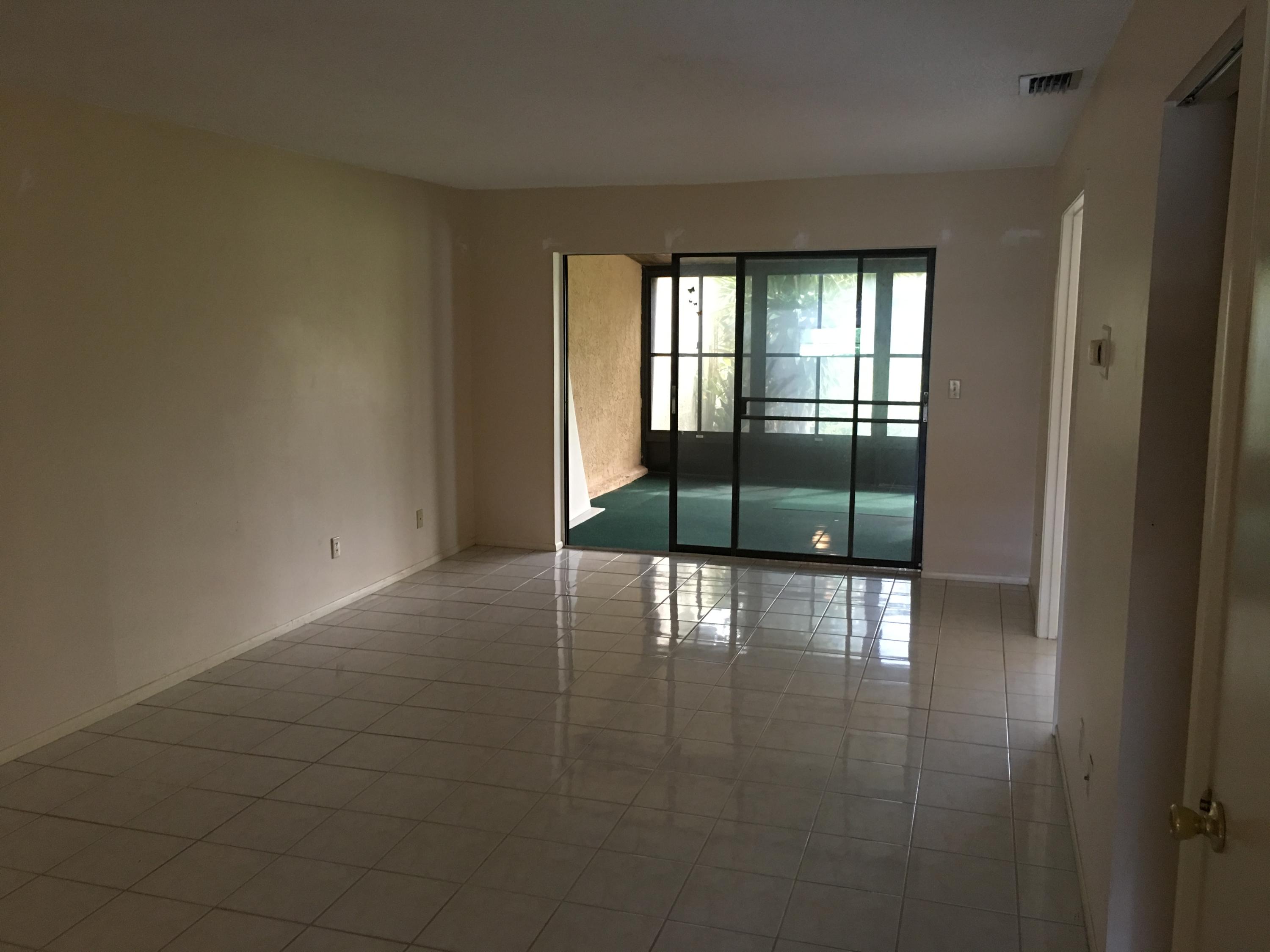 6038 Indrio Road, Unit 7 Fort Pierce, FL 34946 - Photo 3 of 12 Living Rm 2