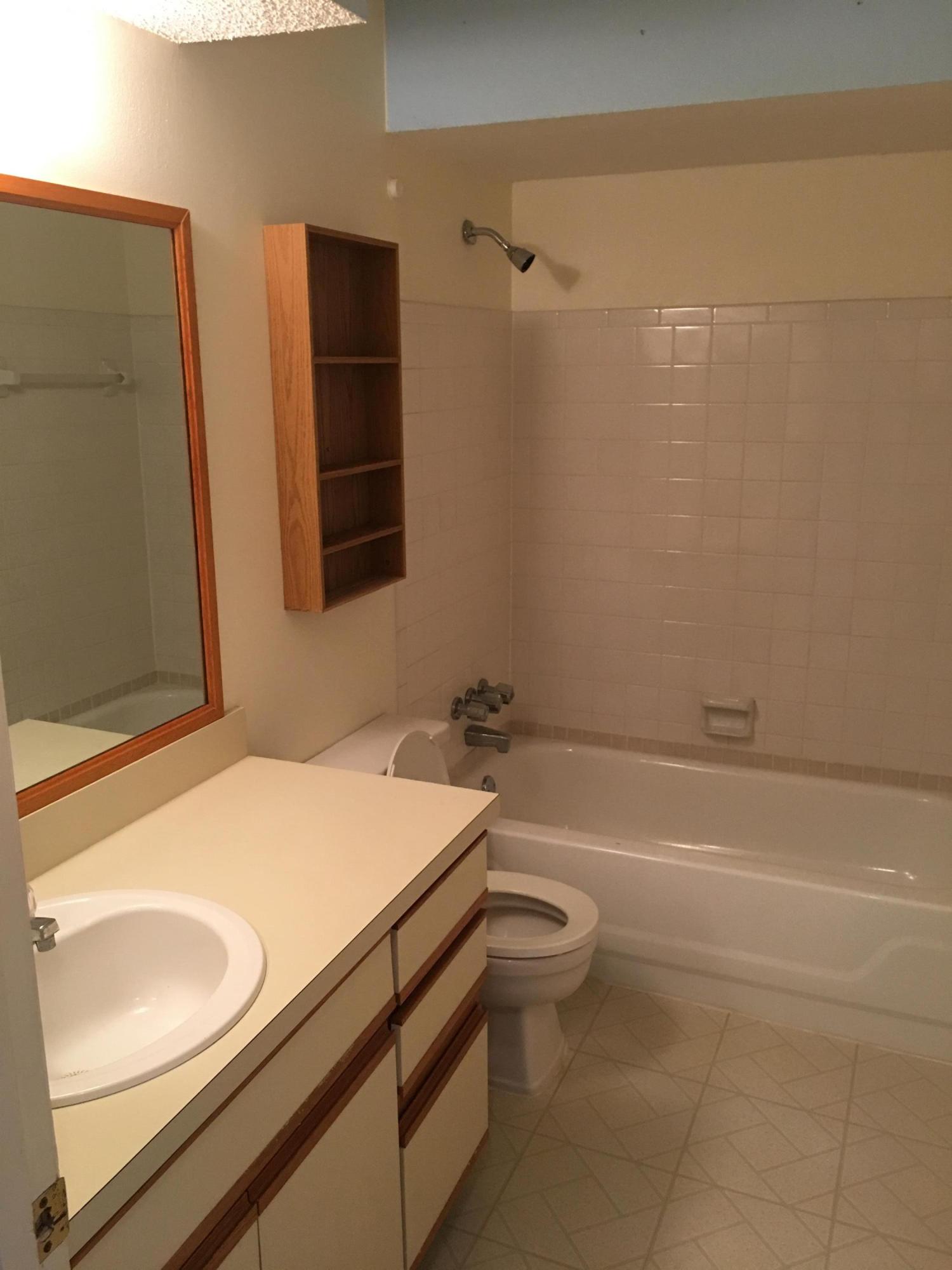 6038 Indrio Road, Unit 7 Fort Pierce, FL 34946 - Photo 4 of 12 Hall Bath