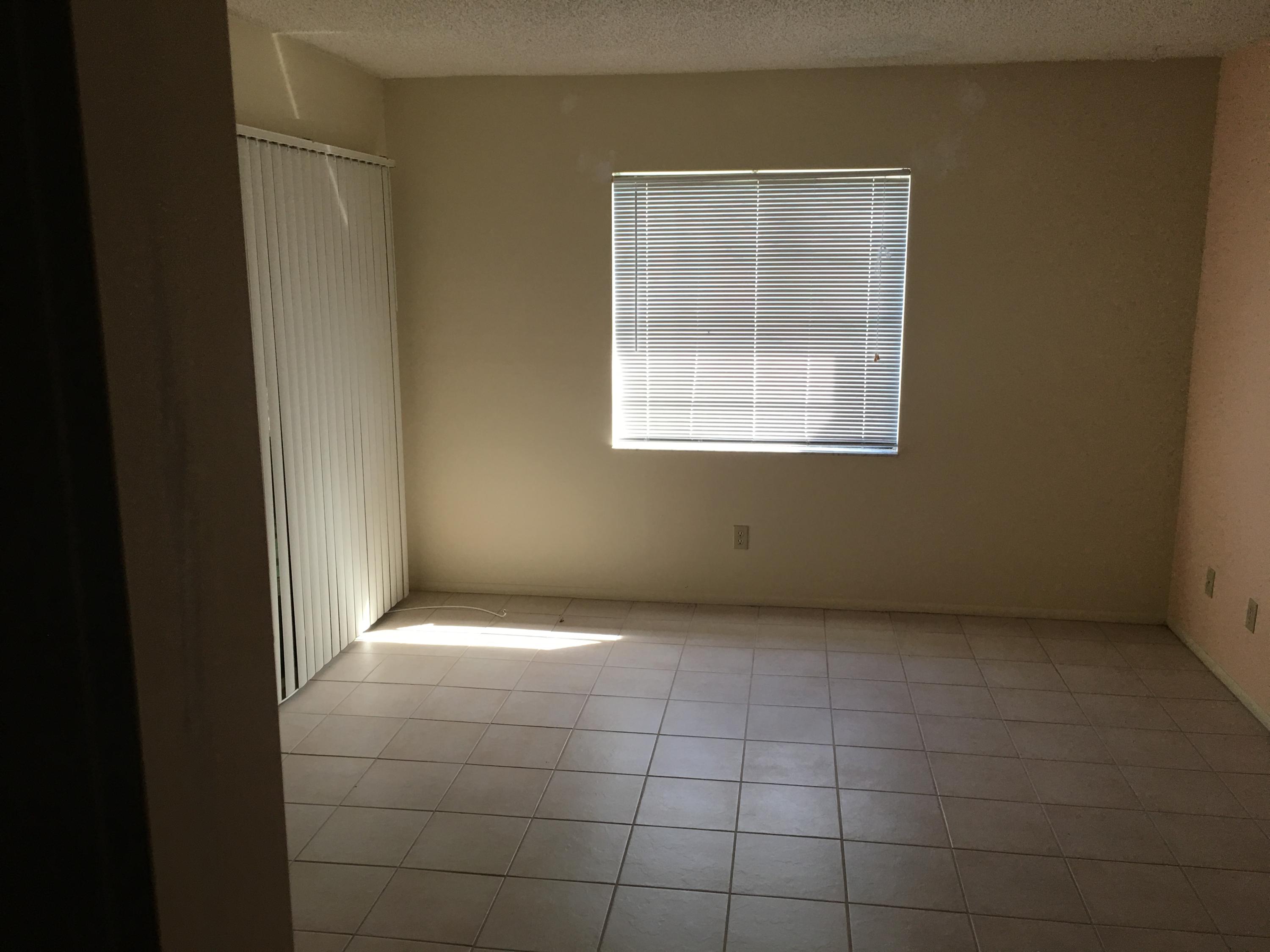 6038 Indrio Road, Unit 7 Fort Pierce, FL 34946 - Photo 7 of 12 Front Bedroom