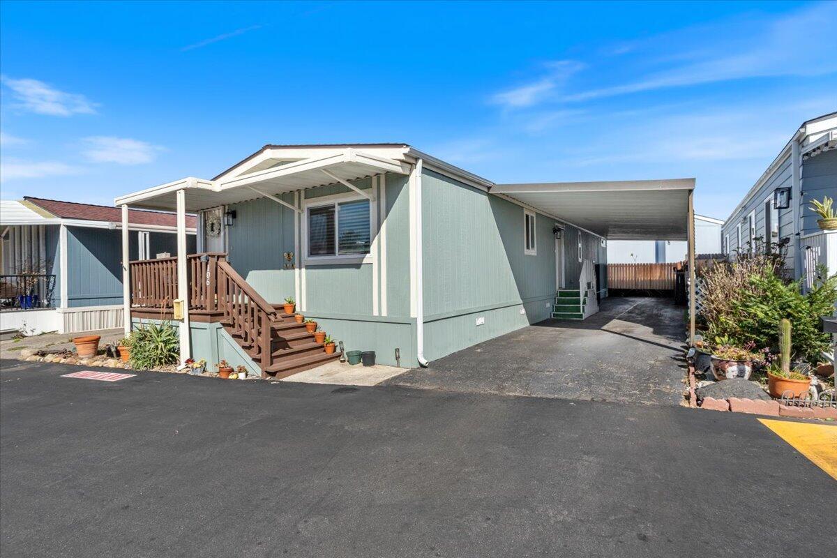 5700 Via Real, Unit 106 Carpinteria, CA 93013 - Photo 2 of 26 a view of a house with porch