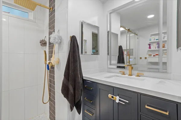 a bathroom with a shower and a toilet