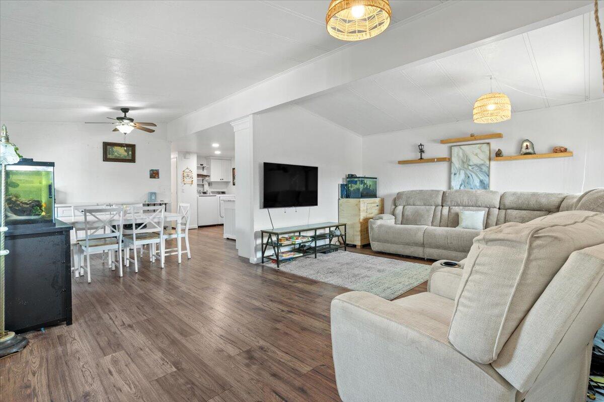 5700 Via Real, Unit 106 Carpinteria, CA 93013 - Photo 7 of 26 a living room with furniture and a flat screen tv