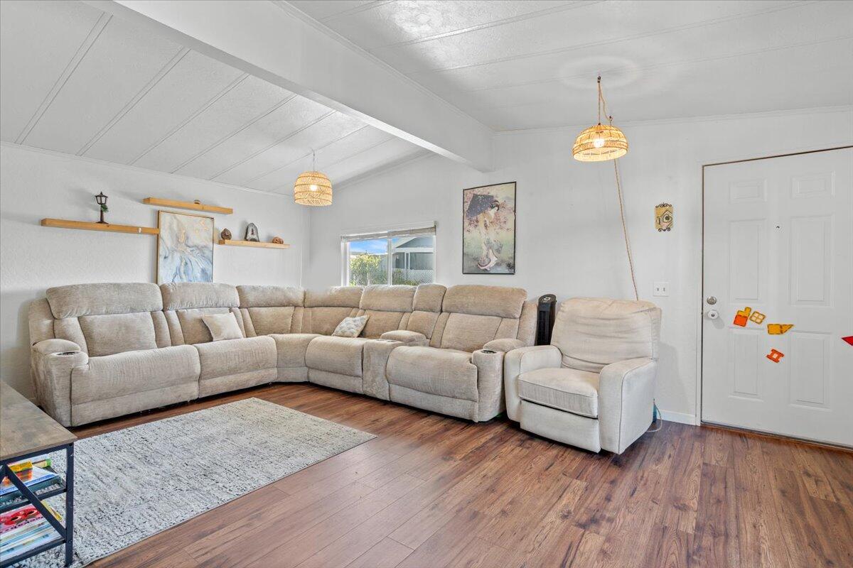 5700 Via Real, Unit 106 Carpinteria, CA 93013 - Photo 9 of 26 a living room with furniture and wooden floor